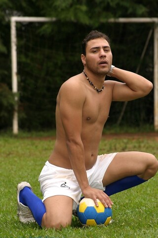 Gay soccer player strips fully naked & jerks his erect dick on the field