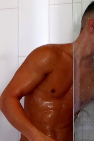 Lean boy Christian Parker Cleans Off After Soaking Himself In Cum