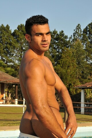 Handsome gay stallion Poax strips poolside & shows his muscular body & big rod