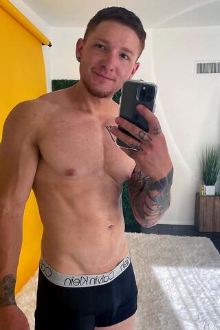 Tatted Jeremiah Cruz Oils Up His Uncut Cock And Rubs One Off!